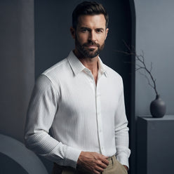 Michael Thorne wearing a white textured popcorn fabric slim-fit shirt in a professional studio portrait.