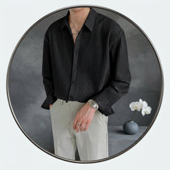 Marcus Wright wearing a textured popcorn fabric slim-fit formal shirt in a professional studio portrait.
